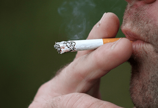 man smoking tobacco